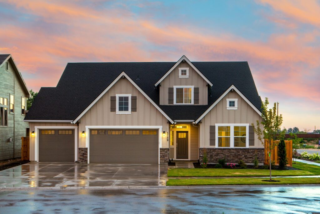 A single family home outside at dusk.